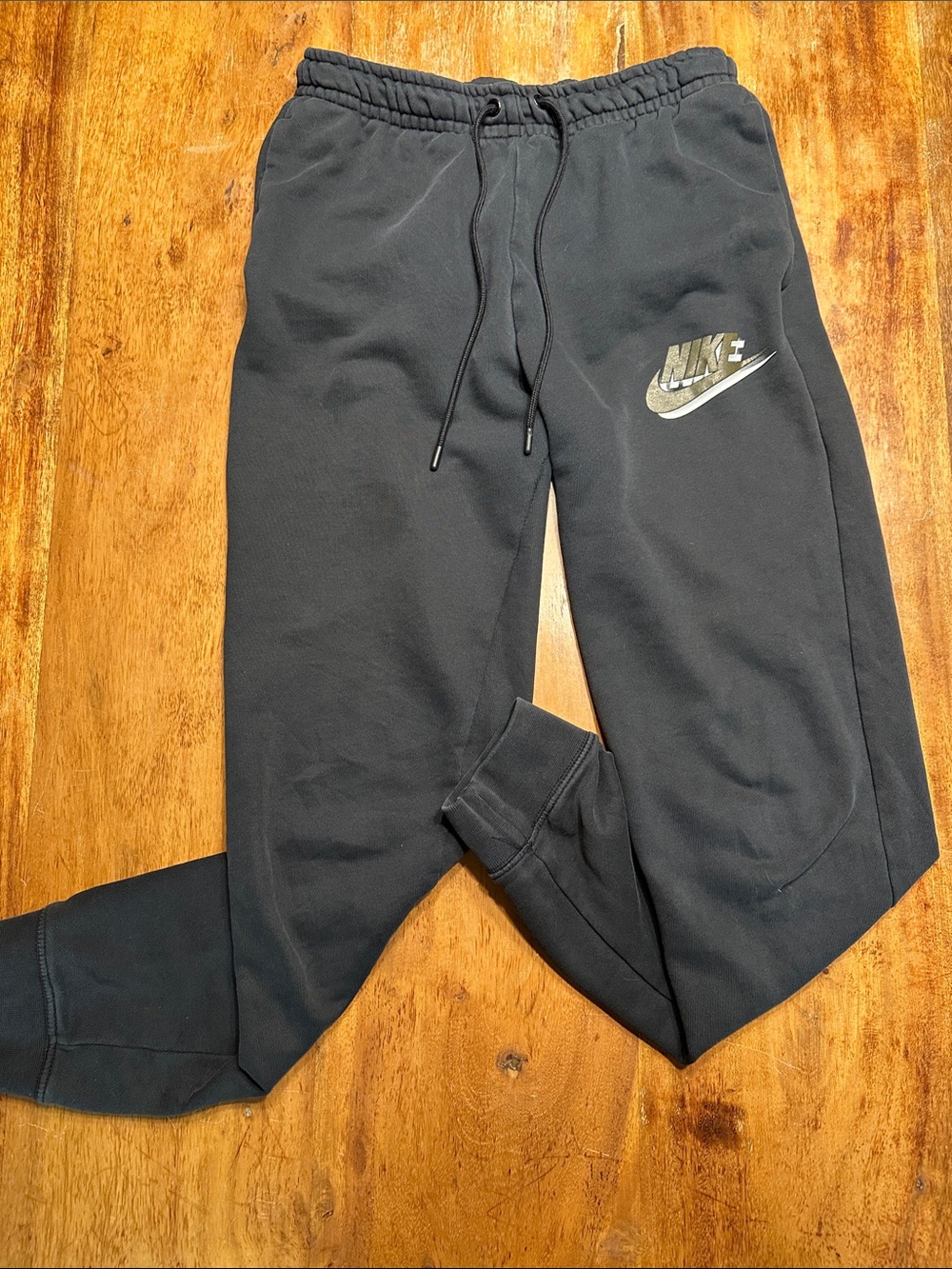 Nike Black Women’s Logo Jogger Sweatpants with Metallic Swoosh